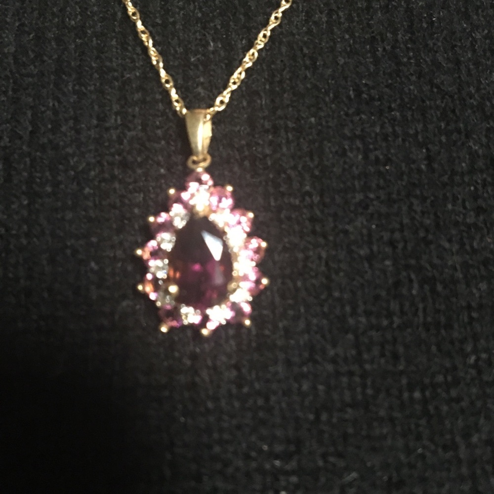 Rubellite 1.5 ct pear shaped stone in 14kt gold